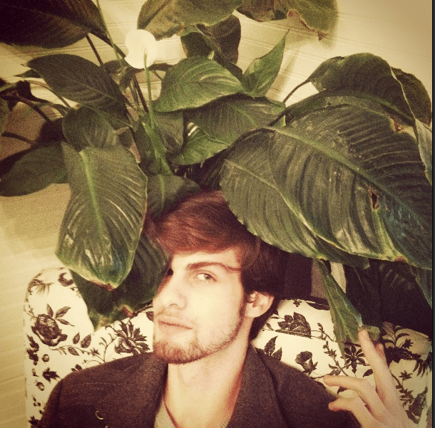 I just had to snag a photo sitting in one of the shop's chairs with a plant practically eating me!