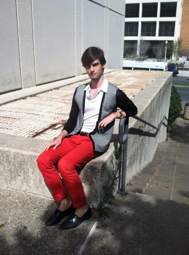 Sitting by a weed next to the Jesse H. Jones College of Communication building. Photo by Ricardo Hernandez