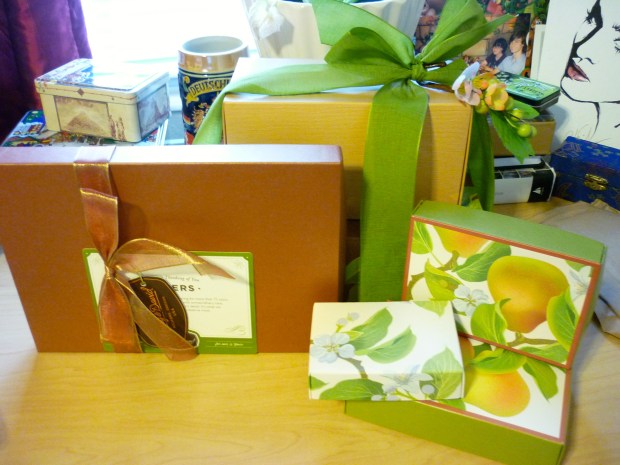 I wonder what rests beneath the pear-printed parcels?