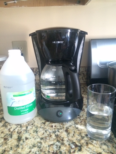 My new Mr. Coffee coffeemaker brewing the anti-chemical solution - vinegar and water.